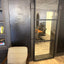 Entrance to the meeting room through a sliding steel and glass door